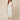 RM1528 white lady dress - front view on model, sleeveless white floral lace column dress with pearl and crystal beaded mandarin collar