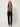 SR401 BROWN VEST V - front view on model, cropped V-neck vest with patch pockets and strap tabs