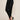 Black mom style pants - front three-quarter, waist-down studio view on Ziba