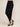 Black mom style pants - front three-quarter, waist-down studio view on Ziba