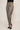 Brown Footer mom style pants - front three-quarter, waist-down studio view on Ziba