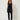 601570 BLACK FRINGE TOP - front view on model, draped cowl halter top with two-button tab and fringe hem, worn with black slim pants