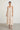 Studio photo on Ziba — exact garment, same pose as reference