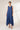 Rima Floral Dress Navy - front, worn by Ziba