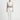 Gray Tina top - front studio view on Ziba with white trousers