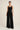 Shams black pleated wide-leg pants - front, worn by Ziba
