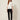 Nova Spring Blouse White on model - front view with flat pointed collar, closed front and sequin flower embellishment