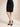 Black jacquard skirt - front, waist-down studio view on Ziba