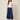 SR371 navy blue V pants front view on model - V waistband with covered button, hip flap panels, wide cropped legs