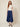 SR371 navy blue V pants front view on model - V waistband with covered button, hip flap panels, wide cropped legs