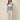 SR397 BLUE AND CREAM B-P SET - front view on model, V-neck top with blue trim and stripes with wide-leg pants