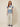 SR397 BLUE AND CREAM B-P SET - front view on model, V-neck top with blue trim and stripes with wide-leg pants