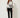 SR419 GEO SL EDGE BLOUSE - front view on model, stand collar with two covered buttons and keyhole, black geometric print on cream