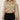 Kaira champagne-gold crinkle jacket - front, worn by Ziba