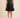 Dani Black Skort — studio view on model (Option B)