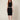 01333364 CHAIN CIRCLE BELT SILVER - front view on model, silver disc and ring chain belt at the waist over a black dress