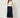 Navy wrap pleated skirt - front view on model
