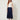 Navy wrap pleated skirt - front view on model
