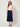 Navy wrap pleated skirt - front view on model