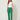 Green tailored trousers - front view on model