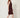 Burgundy textured-stripe sleeveless shift dress, side view walking on model