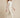 0134025210 model walking v2 - white sheer organza cropped jacket hem just below waist