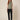 Sage green sleeveless cowl-neck top on model, front view