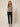 Sage green sleeveless cowl-neck top on model, front view