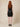 0133868 above-knee model front - black embossed leaf-vein dress