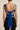 Navy mustard floral cropped top on model, studio