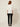 Nova Spring Blouse White on model - back view with center-back zipper and collar from behind