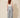 Grey chevron pleated wide-leg pants - model back with belt loops and elastic center back waist
