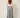 SR TL Edge Pants in grey tropical leaf print - model back view, elasticated gathered back waistband