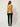 RM1819 RM Yellow Long Top - back view on model, centre-back zipper with the gold cord belt passing around the waist