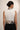 Gray Tina top - back view with centre zip