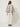 RM1832 gray and gold jacquard cropped jacket on model, back view with piped collar band and raglan seams