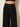 Shams black pleated wide-leg pants - waistband detail, worn by Ziba