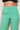 Green Pants - waistband and button detail, worn by Ziba