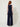 Navy lame sleeveless wide-leg jumpsuit - model back with sash tie