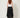 Black studded handkerchief-hem palazzo pants — model back view