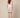 White cherry-blossom scallop-trim mini skirt - model back view