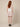 White cherry-blossom scallop-trim mini skirt - model back view