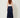 Navy wrap pleated skirt - back view on model