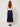 Navy wrap pleated skirt - back view on model