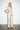 600901 Minimal Pants Cream — model/02-threequarter.jpg