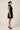 Ziba studio shot — piti-belted-open-front-dress 02-threequarter.webp