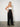 600870 Rise Pants Black — model/02-threequarter.jpg