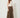 Brown wide-leg culotte pants - model three-quarter