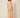 Orange chevron-pleated maxi dress - three-quarter view on model