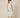 RM1528 white lady dress - three-quarter front view on model, white floral lace with beaded mandarin collar